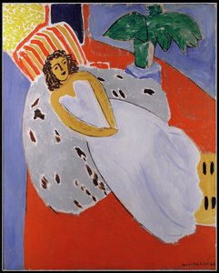 Mujer joven de blanco, fondo rojo de Henri Matisse