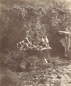 Naturaleza muerta: caldero, jarra y verduras sobre una mesa con caballetes de Henri Victor Regnault
