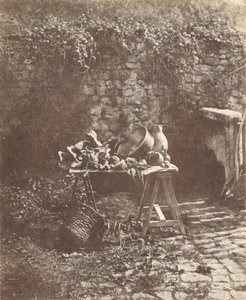 [Bodegón: caldero, jarra y verduras sobre una mesa de caballete].