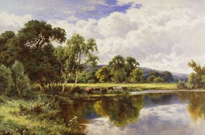 Un paisaje fluvial arbolado con ganado