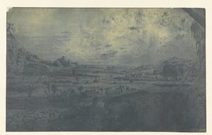 Valle de montaña con campos vallados