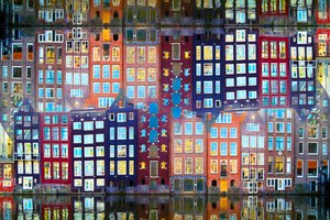 Casas junto al canal iluminadas de Igor Shrayer