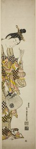 Una cortesana sosteniendo una linterna y un abanico de Ishikawa Toyonobu