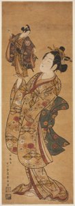 El actor Onoe Kikugoro I sosteniendo una marioneta del actor Sanogawa Ichimatsu I