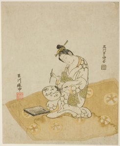 Escribiendo en un abanico de Ishikawa Toyonobu