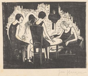 Cuatro mujeres sentadas en una mesa