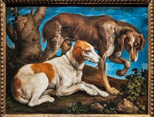 Retrato de dos perros atados a un tronco