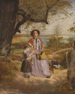 Madre e hijo junto a un muelle, con Culver Cliff, Isla de Wight, en la distancia.