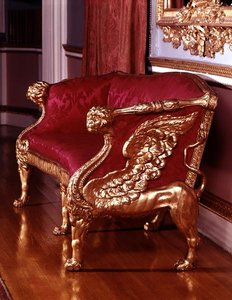 Sofá con soportes de león alado