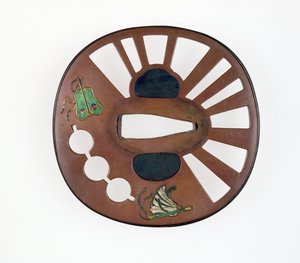Tsuba decorada con abanicos
