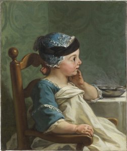 Niño en una silla alta