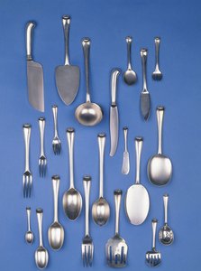 Parte de un juego de cubiertos de plata de Jean Elysée Puiforcat