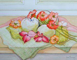 Manzanas y Capuchinas sobre un mantel verde