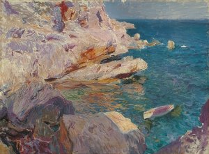 Rocas de Jávea con barco blanco