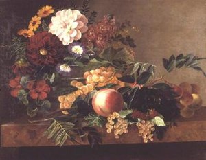 Flores y frutas en una mesa de mármol