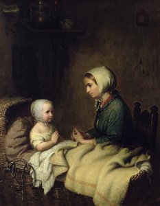 Niña rezando en la cama