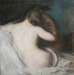 Mujer secándose el pelo