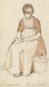 Niña sentada con una cesta