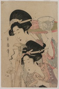 Dos geishas junto a una vela