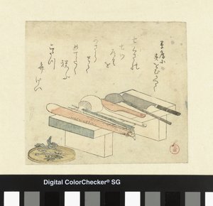 Utensilios de cocina en una tabla para picar de Kubota Shunman