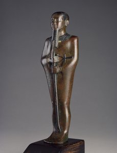 Estatuilla del dios Ptah (bronce con pigmento negro y plata y oro incrustados)