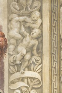 Putti, decoraciones alrededor de las ventanas