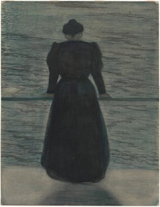 Mujer junto al mar