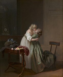 Dos mujeres jóvenes besándose
