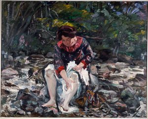 Niña en el arroyo