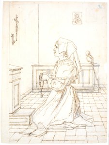 Mujer arrodillada en oración