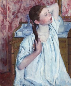 Niña Arreglando su Cabello