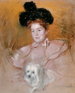 Mujer sosteniendo un perro