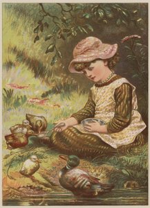 Niña alimentando a los patitos