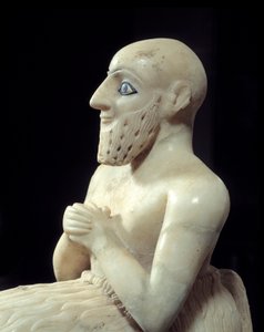 Arte mesopotámico: Estatua del intendente Ebih-il. Escultura de alabastro, concha, lapislázuli y esquisto, alrededor de 2500 a.C. (período sumerio, alrededor de 2900-2200 a.C.). De Mari. Altura: 0.525 m. París, Museo del Louvre de Mesopotamian