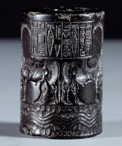 Mesopotamia: sello cilíndrico en mármol negro en nombre del divino Sharkali-Sharri (Shakalisharri), Rey de Agade adornado con héroes regando búfalos adosados. 2300 a.C. de Mesopotamian Mesopotamian