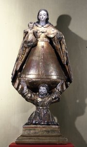 San Francisco sosteniendo a la Virgen y el Niño