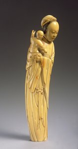 Figura de Guanyin sosteniendo a un niño (marfil tallado)