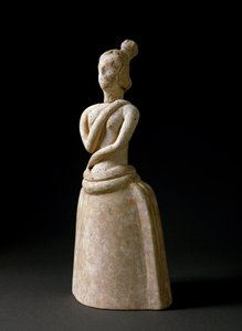 Arte minoico: figurilla de terracota de una mujer en actitud de adoración de Minoan