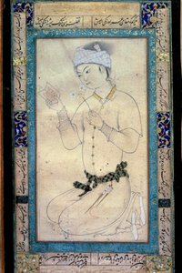 Un joven con libros y narcisos. Miniatura persa en gouache de Muhammad Shaykh