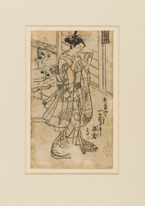 Grabado en madera - Onoe Kikingoro I como una mujer leyendo un libro, siglo XVIII