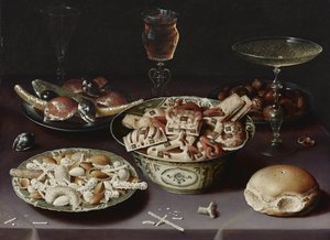 Naturaleza muerta con dulces, castañas y un panecillo