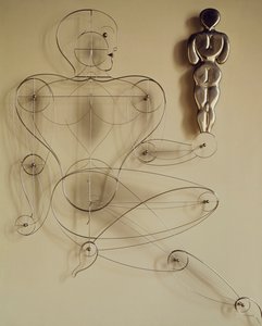 Homo, figura de alambre con figura trasera en la mano