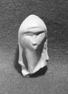 Cabeza de una Mujer conocida como Venus de Brassempouy, c. 21000 a.C.