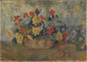 Capuchinas y dalias en una cesta