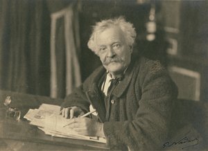 Félix Nadar sentado ante un escritorio de Paul Nadar