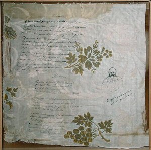Trozo de mantel en el que Verlaine ha escrito sus poemas 