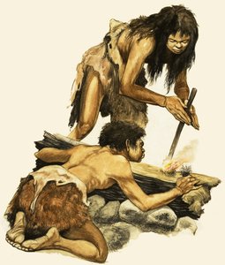 Madre e hijo de la Edad de Piedra haciendo fuego