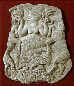 Arte fenicio: tapa de píxide tallada en marfil, representando a una diosa de la fertilidad micénica alimentando cabras de Phoenician
