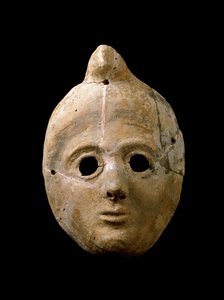Arte fenicio: máscara de mujer de terracota. De Puerta de la Tierra. Siglos IV - III a.C. Cádiz, Museo de Cádiz, España de Phoenician