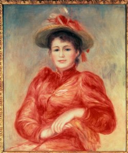 Joven mujer con blusa roja de Pierre Auguste Renoir
